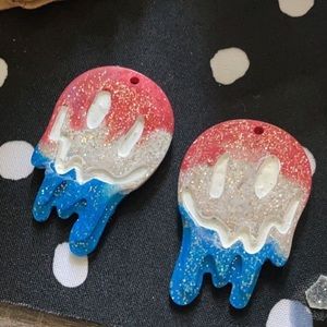 Red wjite and blue goopy face earrings